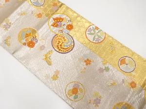 丸紋に蝶・藤・花模様織出し袋帯